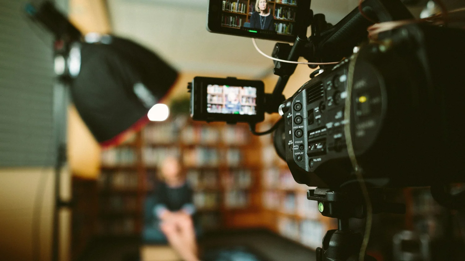 A camera filming a live-action performance